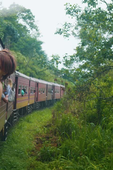 Leaning out of the train in the hills